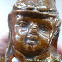 Load image into Gallery viewer, Antique Staffordshire / Scottish 19th Century Bank or Money Box with Treacle Glaze. In the form of a Little Double-Sided Man
