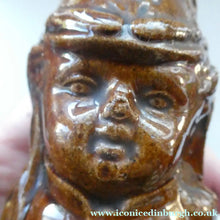 Load image into Gallery viewer, Antique Staffordshire / Scottish 19th Century Bank or Money Box with Treacle Glaze. In the form of a Little Double-Sided Man
