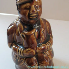 Load image into Gallery viewer, Antique 19th Century Treacle Glazed SCOTTISH POTTERY Money Box or Bank in the Form of a Seated Gentleman - British
