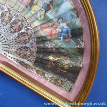 Load image into Gallery viewer, Antique FRAMED Hand Painted Fan with mother of pearl sticks and guards:  shaped, carved, pierced and gilt. FETE GALANTE design
