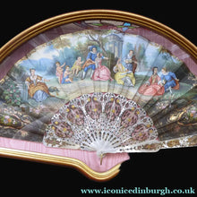 Load image into Gallery viewer, Antique FRAMED Hand Painted Fan with mother of pearl sticks and guards:  shaped, carved, pierced and gilt. FETE GALANTE design
