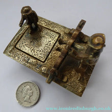Load image into Gallery viewer, ANTIQUE INKWELL. An Extremely Rare Miniature Example Featuring a Little Man in Village Stocks Being Pelted with Fruit

