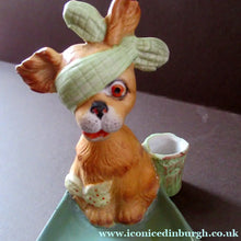 Load image into Gallery viewer, Bisque Porcelain Figure by Schafer &amp; Vater. Comical Dog Model Set Onto an Ashtray
