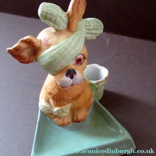 Load image into Gallery viewer, Bisque Porcelain Figure by Schafer &amp; Vater. Comical Dog Model Set Onto an Ashtray
