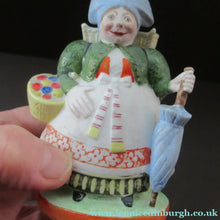 Load image into Gallery viewer, Bisque Porcelain Figure by Schafer &amp; Vater. Match Holder in the Form of a Lady Carrying a Basket 
