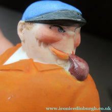 Load image into Gallery viewer, Porcelain Figure by Schafer &amp; Vater. Match Holder in the Form of a Man in an Orange Jacket: ON STRIKE
