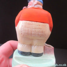 Load image into Gallery viewer, Porcelain Figure by Schafer &amp; Vater. Match Holder in the Form of a Man in an Orange Jacket: ON STRIKE
