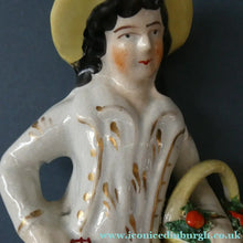 Load image into Gallery viewer, Victorian Staffordshire Figurines. Couple Harvesting and Carrying Baskets of Fruit
