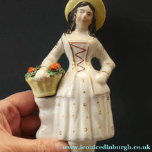 Load image into Gallery viewer, Victorian Staffordshire Figurines. Couple Harvesting and Carrying Baskets of Fruit
