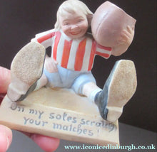 Load image into Gallery viewer, Antique Porcelain Match Holder &amp; Striker by Schafer &amp; Vater. FOOTBALLER HOLDING A FOOTBALL
