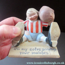 Load image into Gallery viewer, Antique Porcelain Match Holder &amp; Striker by Schafer &amp; Vater. FOOTBALLER HOLDING A FOOTBALL
