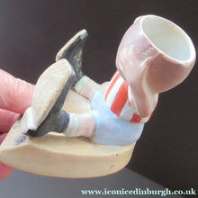 Load image into Gallery viewer, Antique Porcelain Match Holder &amp; Striker by Schafer &amp; Vater. FOOTBALLER HOLDING A FOOTBALL
