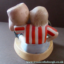 Load image into Gallery viewer, Antique Porcelain Match Holder &amp; Striker by Schafer &amp; Vater. FOOTBALLER HOLDING A FOOTBALL
