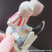 Load image into Gallery viewer, Antique Porcelain Match Holder &amp; Striker by Schafer &amp; Vater. FOOTBALLER HOLDING A FOOTBALL
