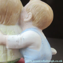 Load image into Gallery viewer, Porcelain Match Holder by Schafer &amp; Vater. GOOGLE EYED COUPLE EMBRACING
