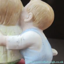 Load image into Gallery viewer, Porcelain Match Holder by Schafer &amp; Vater. GOOGLE EYED COUPLE EMBRACING
