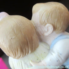 Load image into Gallery viewer, Porcelain Match Holder by Schafer &amp; Vater. GOOGLE EYED COUPLE EMBRACING
