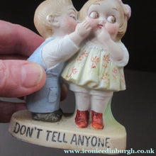 Load image into Gallery viewer, Porcelain Match Holder by Schafer &amp; Vater. GOOGLE EYED COUPLE EMBRACING
