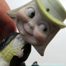 Load image into Gallery viewer, Antique Porcelain Nodder or Swinger Pin Tray by Schafer &amp; Vater. Boy Wearing Yellow Straw Hat with Black Cat
