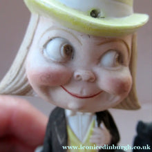 Load image into Gallery viewer, Antique Porcelain Nodder or Swinger Pin Tray by Schafer &amp; Vater. Boy Wearing Yellow Straw Hat with Black Cat
