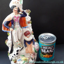 Load image into Gallery viewer, Antique STAFFORDSHIRE Figurine. Rarer Group of Huntsman, Dog &amp; Game, and Little Seated Girl. Excellent Condition. 11 1/4 inches high
