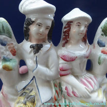Load image into Gallery viewer, ANTIQUE Victorian Staffordshire Figurine. Poor Man's Clock. Two Highland Figures with Fruiting Vine
