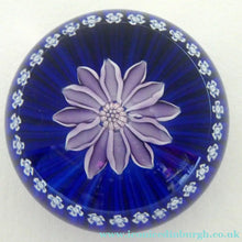Load image into Gallery viewer, Scottish Paperweight by Peter McDougall Glass Studio. With Studio Cane on the Base with lilac lampwork flower 
