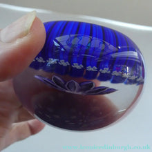 Load image into Gallery viewer, Scottish Paperweight by Peter McDougall Glass Studio. With Studio Cane on the Base with lilac lampwork flower 
