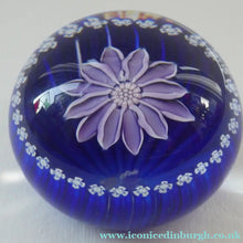 Load image into Gallery viewer, Scottish Paperweight by Peter McDougall Glass Studio. With Studio Cane on the Base with lilac lampwork flower 
