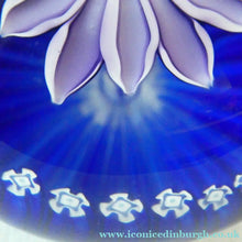 Load image into Gallery viewer, Scottish Paperweight by Peter McDougall Glass Studio. With Studio Cane on the Base with lilac lampwork flower 
