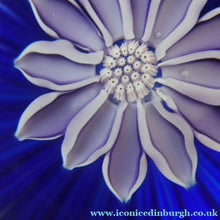Load image into Gallery viewer, Scottish Paperweight by Peter McDougall Glass Studio. With Studio Cane on the Base with lilac lampwork flower 
