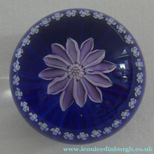 Load image into Gallery viewer, Scottish Paperweight by Peter McDougall Glass Studio. With Studio Cane on the Base with lilac lampwork flower 
