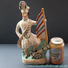 Load image into Gallery viewer, CRIMEAN WAR Interest. 1850s Antique Staffordshire Figurine of a Scottish Soldier with Raised Flag. SCOTLAND'S PRIDE
