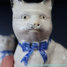 Load image into Gallery viewer, Cute Little Pair of Antique Staffordshire Pottery Mantle Cats with Blue Bows; c 1900
