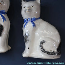 Load image into Gallery viewer, Cute Little Pair of Antique Staffordshire Pottery Mantle Cats with Blue Bows; c 1900
