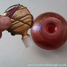 Load image into Gallery viewer, Early Vintage ISLE OF WIGHT Perfume Bottle (Golden Peacock in Pink) with Lollipop Stopper. 4 1/4 inches 
