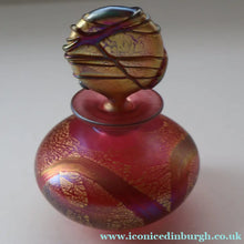 Load image into Gallery viewer, Early Vintage ISLE OF WIGHT Perfume Bottle (Golden Peacock in Pink) with Lollipop Stopper. 4 1/4 inches 
