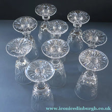 Load image into Gallery viewer, EDINBURGH CRYSTAL. Set of NINE Matching Sherry Glasses. STAR OF EDINBURGHPattern. 4 1/2 inches
