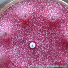 Load image into Gallery viewer, Exquisite Paul Ysart HARLAND PAPERWEIGHT; with Pink Ground,  Glitter Flowerpiece and Controlled Air Bubbles. Signed with H Cane
