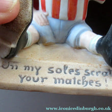 Load image into Gallery viewer, Antique Porcelain Match Holder &amp; Striker by Schafer &amp; Vater. FOOTBALLER HOLDING A FOOTBALL
