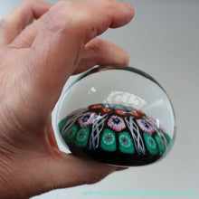 Load image into Gallery viewer, Fine VASART Scottish Glass Paperweight with 7 Short Spokes; with black ground, thick latticino spokes &amp; larger millefiori canes
