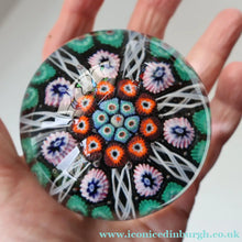 Load image into Gallery viewer, Fine VASART Scottish Glass Paperweight with 7 Short Spokes; with black ground, thick latticino spokes &amp; larger millefiori canes
