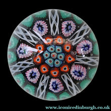 Load image into Gallery viewer, Fine VASART Scottish Glass Paperweight with 7 Short Spokes; with black ground, thick latticino spokes &amp; larger millefiori canes
