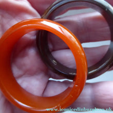 Load image into Gallery viewer, Set of Four Art Deco Bakelite Napkin Rings. Mostly Amber 1930s
