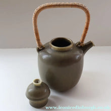 Load image into Gallery viewer, Highly Collectable 1960s DANISH ART POTTERY. Teapot with Wicker Handle. Designed by Frode Blichfeldt Bahnsen for Palshus

