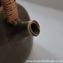 Load image into Gallery viewer, Highly Collectable 1960s DANISH ART POTTERY. Teapot with Wicker Handle. Designed by Frode Blichfeldt Bahnsen for Palshus
