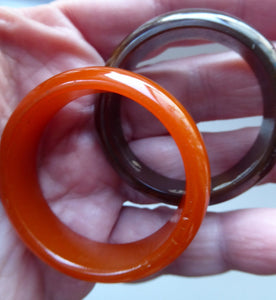 Set of Four Art Deco Bakelite Napkin Rings. Mostly Amber 1930s
