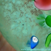 Load image into Gallery viewer, Pink Floral Lampwork Paperweight on Green Ground with JOHN DEACONS Cane
