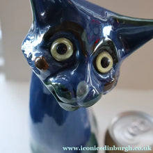 Load image into Gallery viewer, Large ANTIQUE CH Brannam Pottery, Barnstaple, Devon Model of a Seated Cat with Original Yellow Glass Eyes
