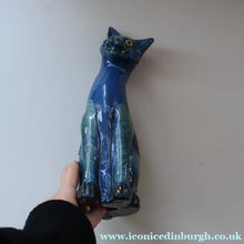 Load image into Gallery viewer, Large ANTIQUE CH Brannam Pottery, Barnstaple, Devon Model of a Seated Cat with Original Yellow Glass Eyes
